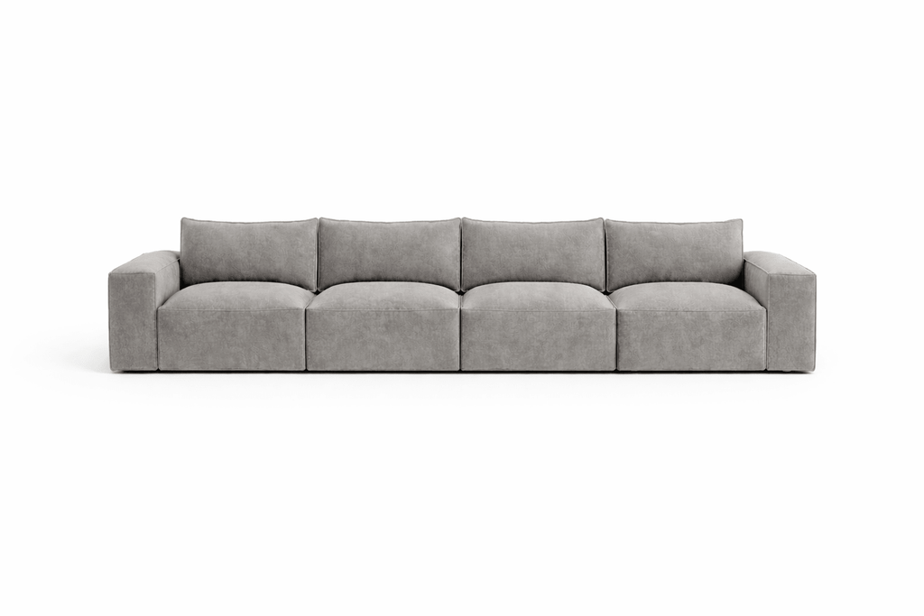 Modern grey modular sofa with deep seats and wide armrests on white background