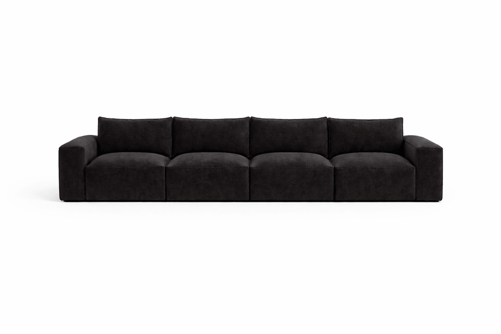 Modern black modular sofa with deep seats and square arms on white background