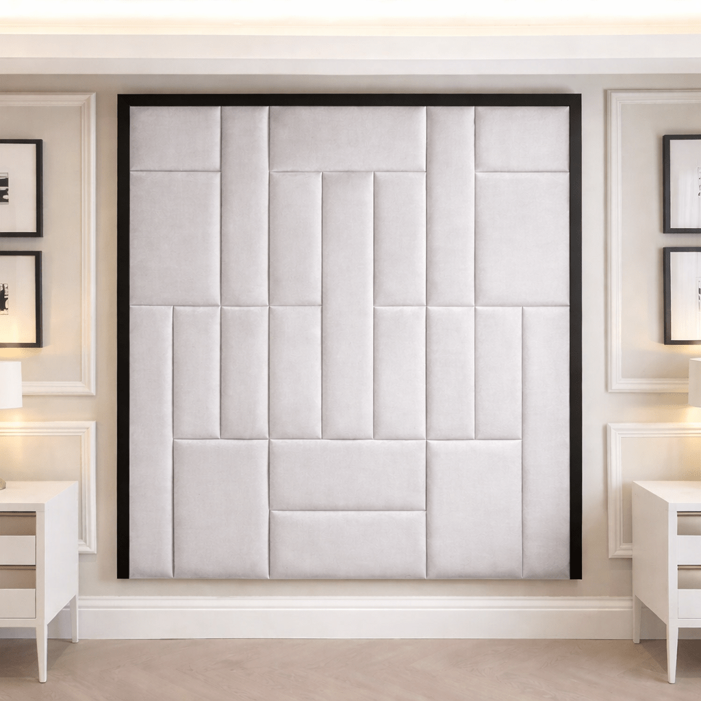 Modern upholstered headboard wall panel in a luxury bedroom with neutral decor