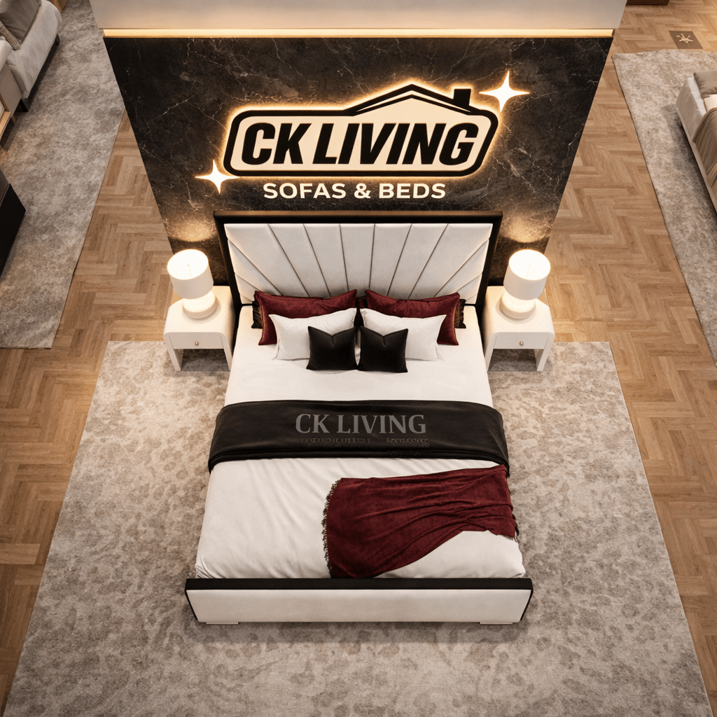Modern luxury bed with white and burgundy bedding, upholstered headboard, bedside tables, and lamps