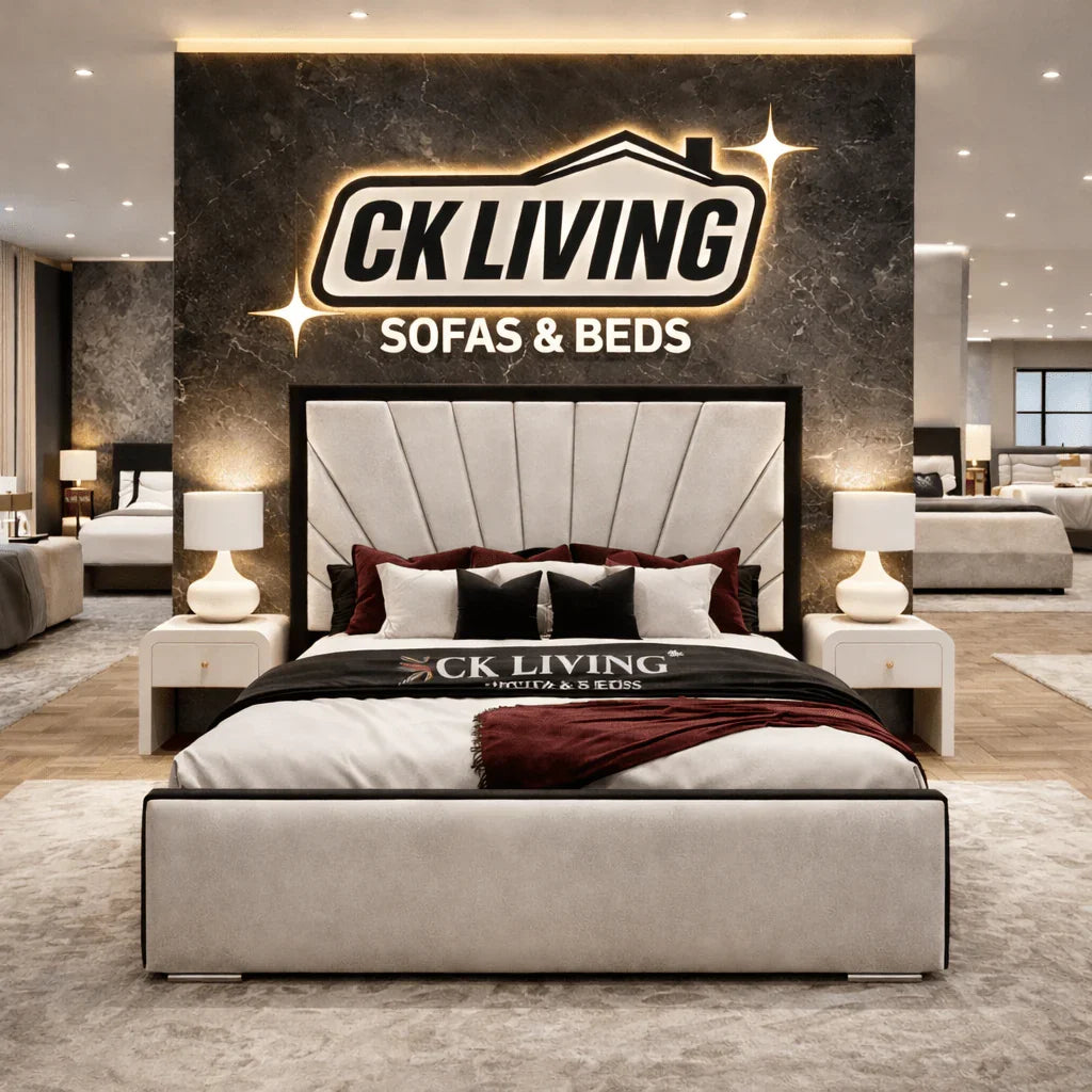 Luxury upholstered bed with tufted headboard in modern showroom, CK Living Sofas & Beds display