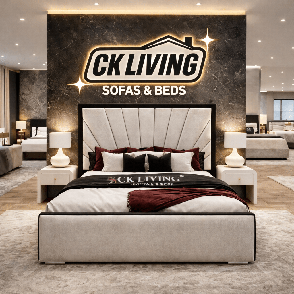 Luxury upholstered bed with accent pillows and modern nightstands in elegant showroom
