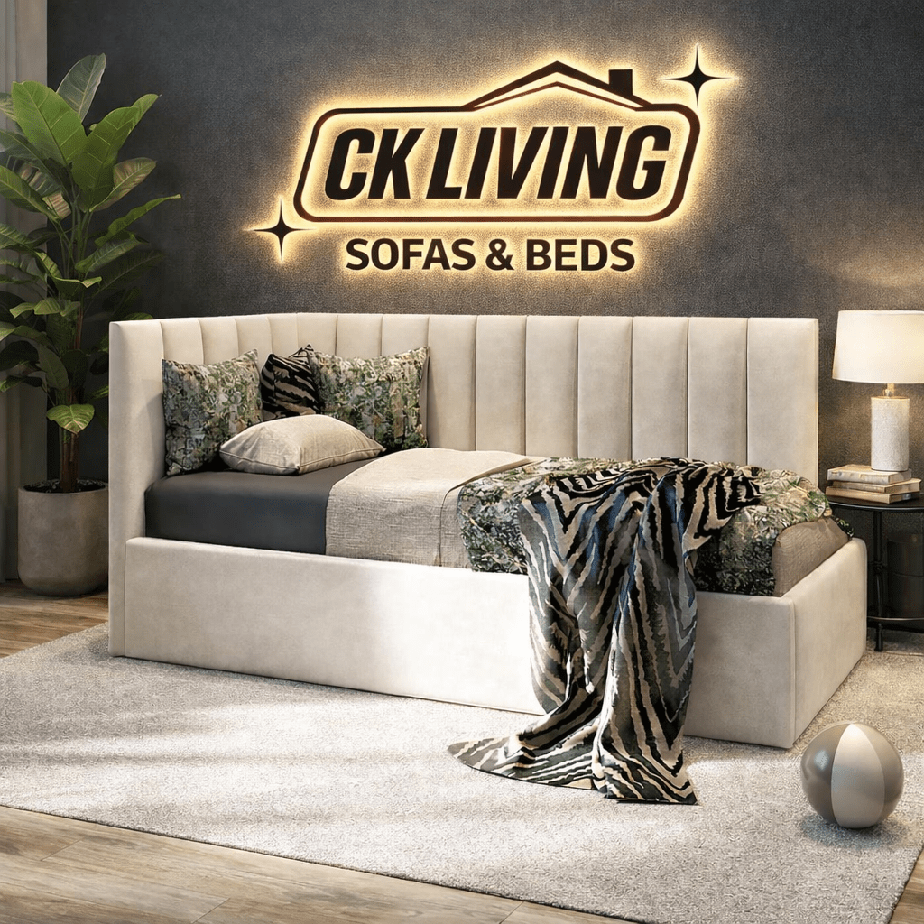 Modern upholstered bed with plush pillows and throw blanket in a stylish bedroom setting
