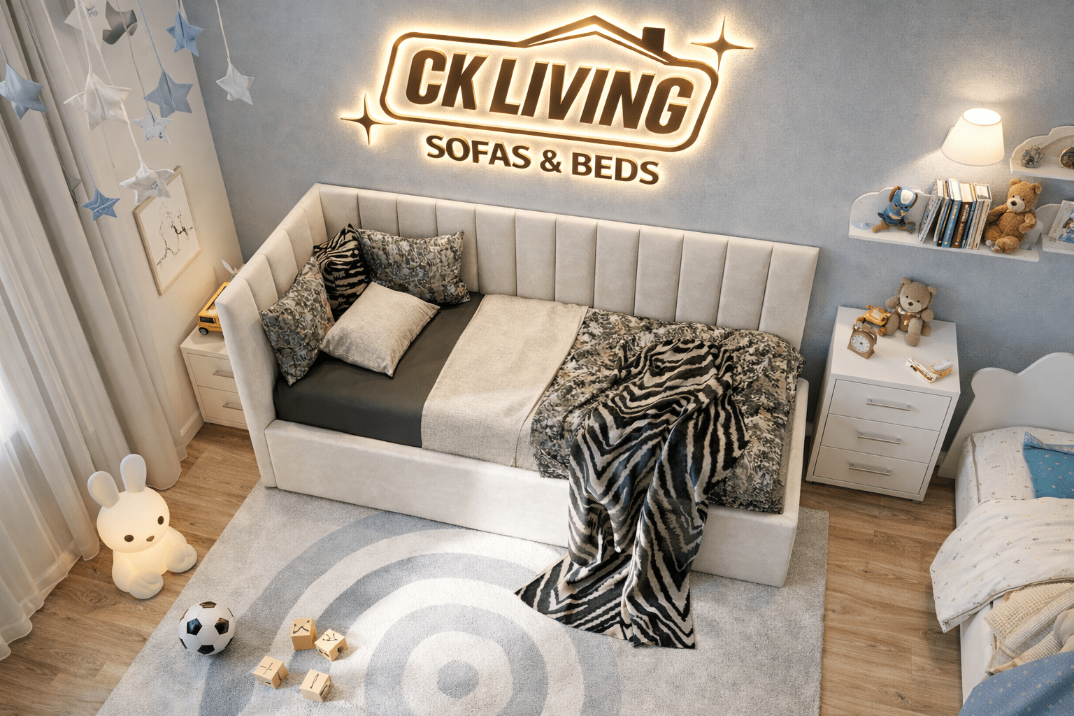 Modern upholstered daybed with pillows and throw in a cozy kids bedroom, playful decor accents