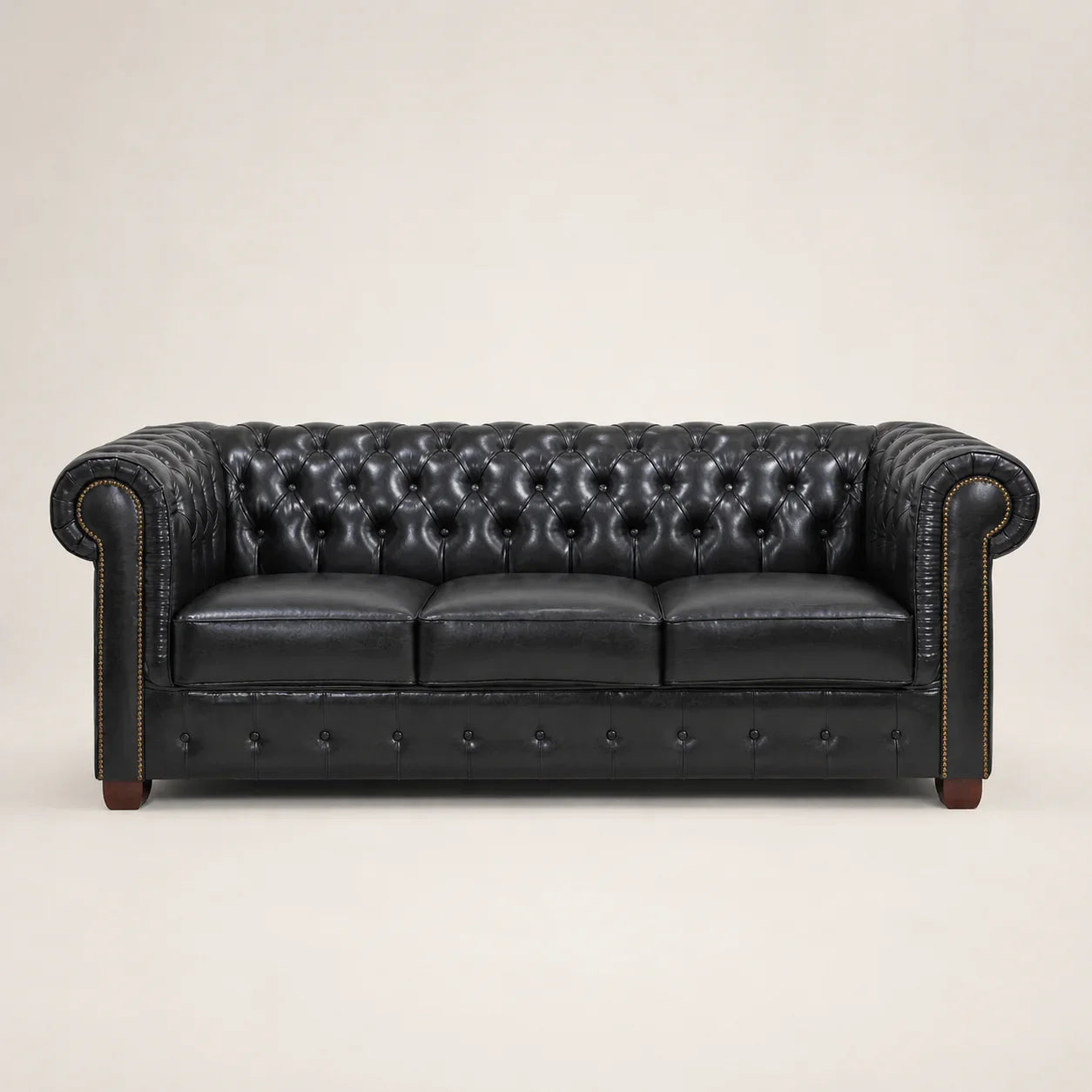 Black leather Chesterfield sofa with tufted back and rolled arms, luxury living room furniture