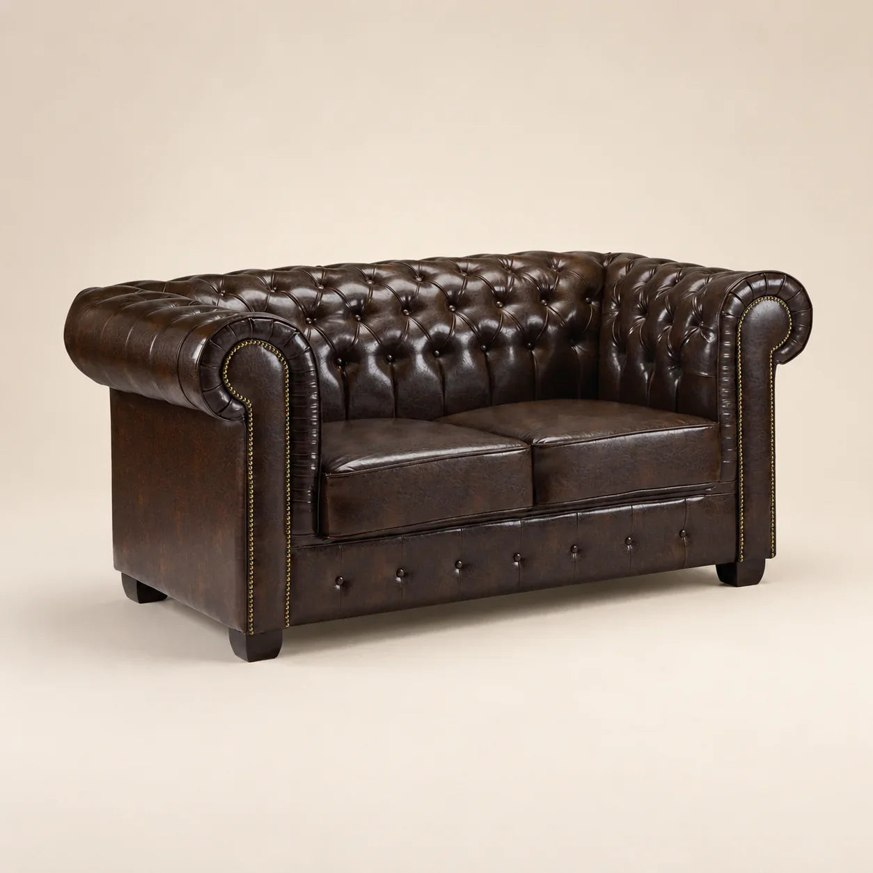 Luxury brown leather Chesterfield sofa with tufted back and rolled arms, ideal for elegant living rooms