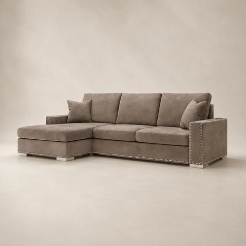 Luxury grey sectional sofa with chaise and nailhead trim, perfect for modern living rooms