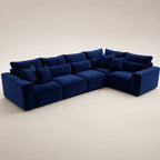 Luxury navy blue velvet sectional sofa with plush cushions, ideal for modern living rooms