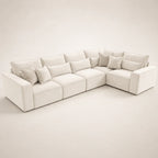 Luxury white sectional sofa with plush cushions and throw pillows, modern living room furniture