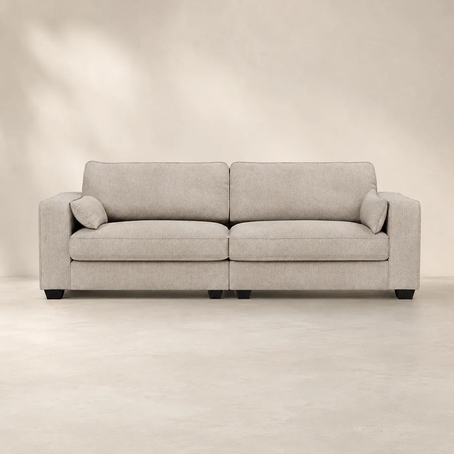 Luxury beige fabric sofa with plush cushions and black legs, ideal for modern living rooms