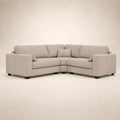 Luxury beige corner sofa with plush cushions and dark legs, ideal for modern living rooms