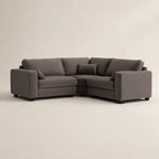 Modern grey L-shaped sectional sofa with plush cushions, ideal for luxury living rooms
