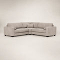 Modern grey L-shaped sectional sofa with plush cushions and dark legs, ideal for luxury living rooms