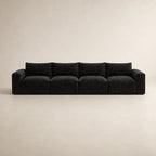 Black modular luxury sofa with plush cushions, modern design for contemporary living rooms