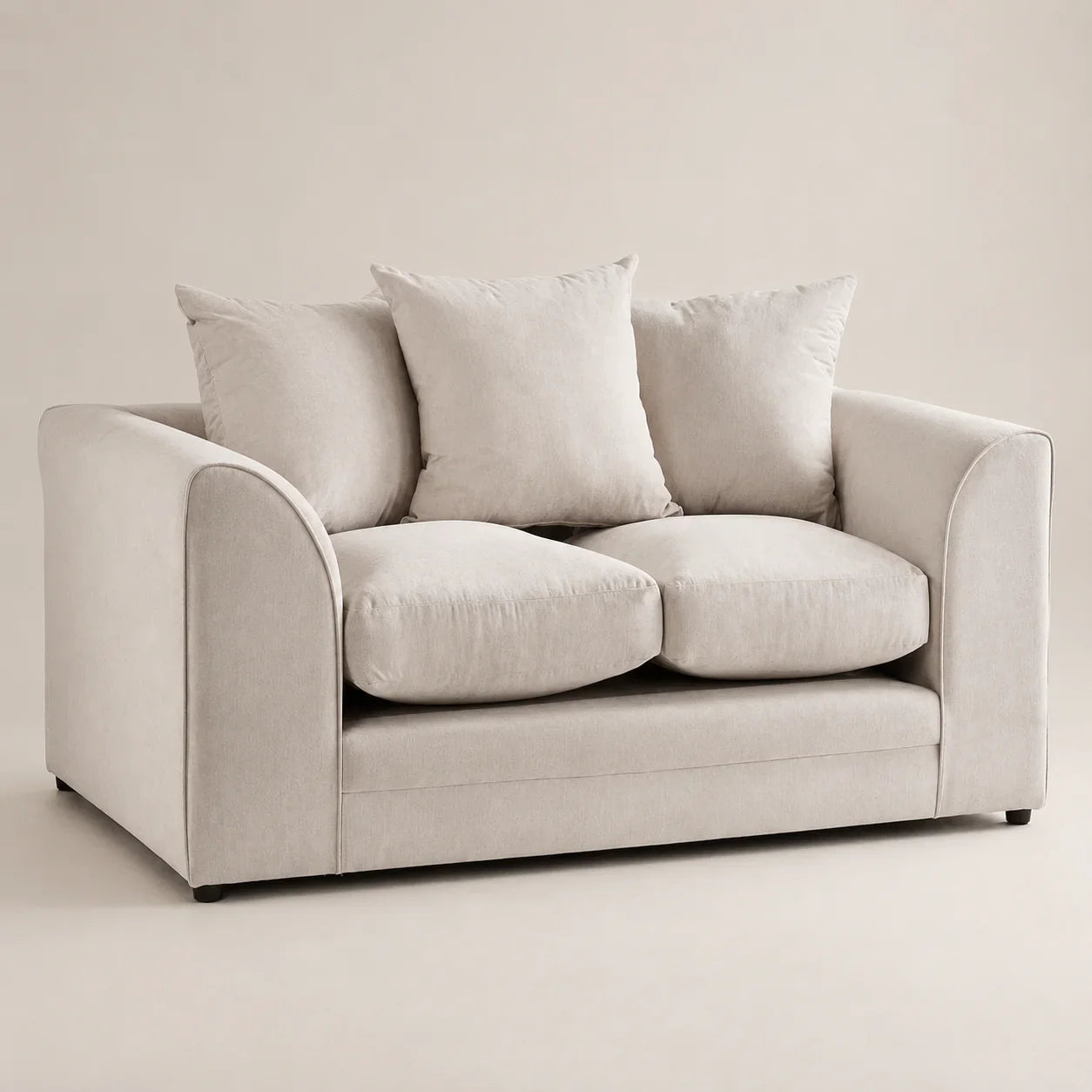 Luxury beige two-seater sofa with plush cushions, ideal for modern living rooms