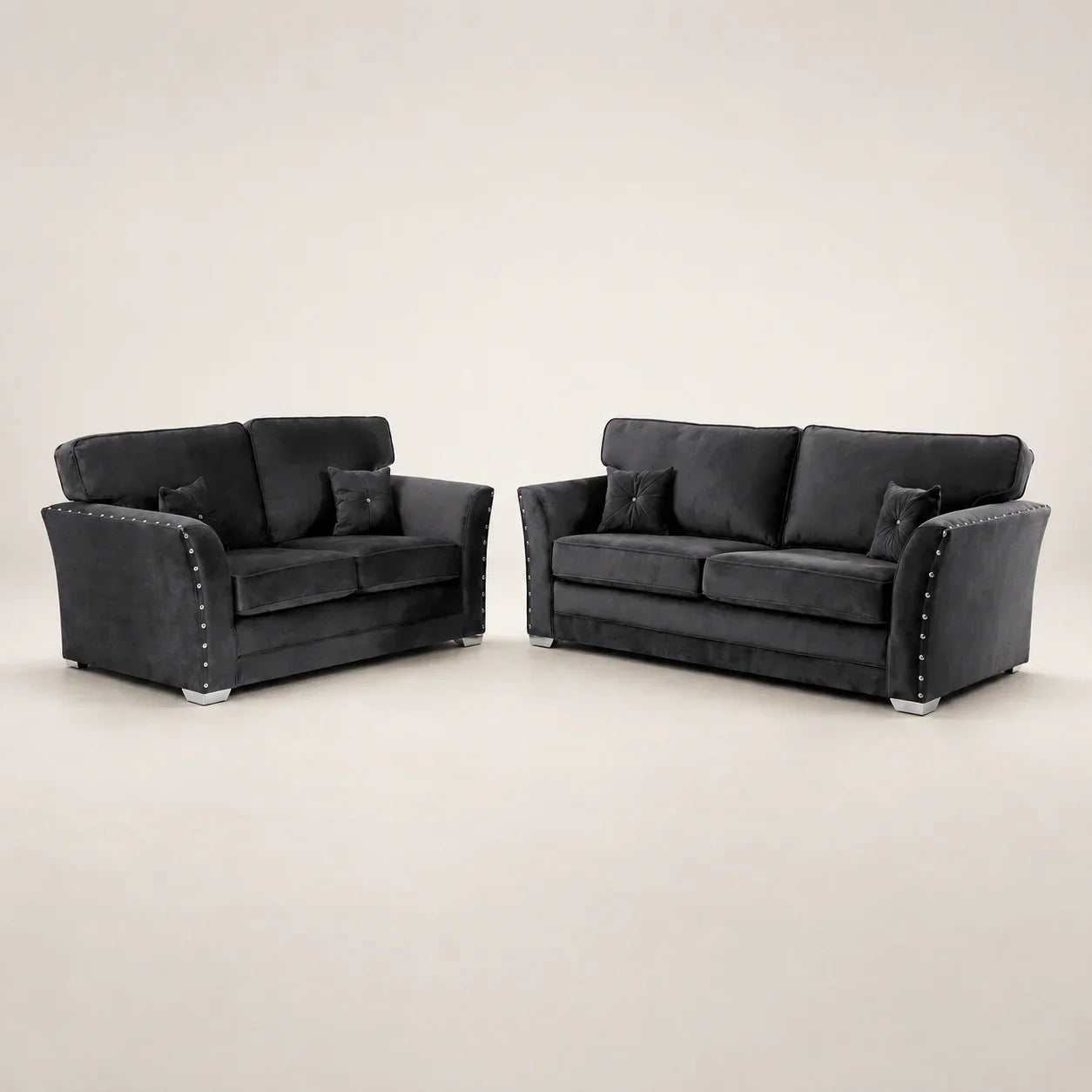 Luxury black velvet sofa set with studded arms and matching cushions, perfect for modern living rooms.