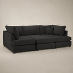 Black modular sectional sofa with chaise and plush cushions for modern living room