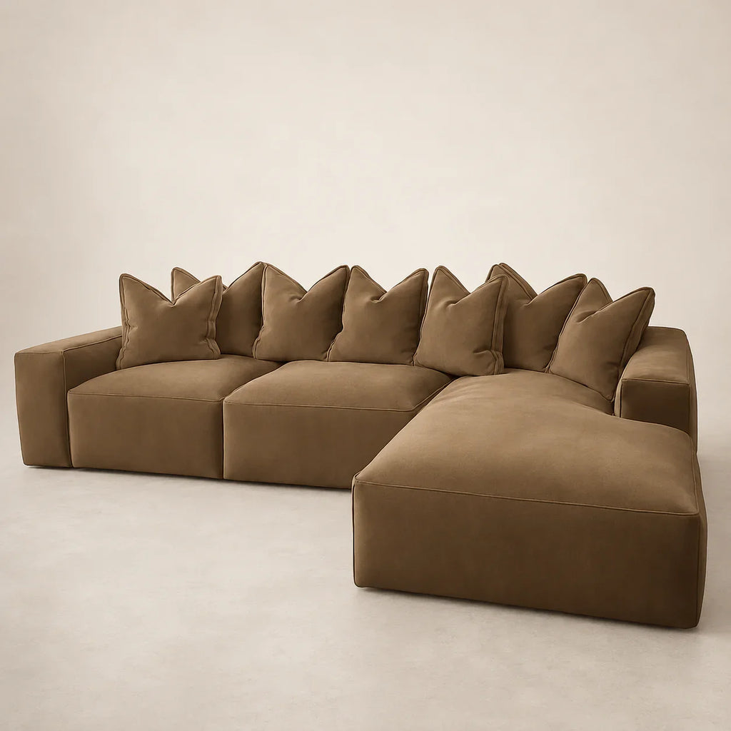 Luxury brown sectional sofa with plush cushions and chaise, ideal for modern living rooms
