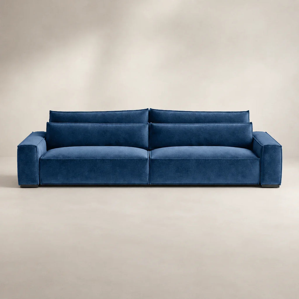 Luxury navy blue velvet sofa with modern design, perfect for contemporary living rooms