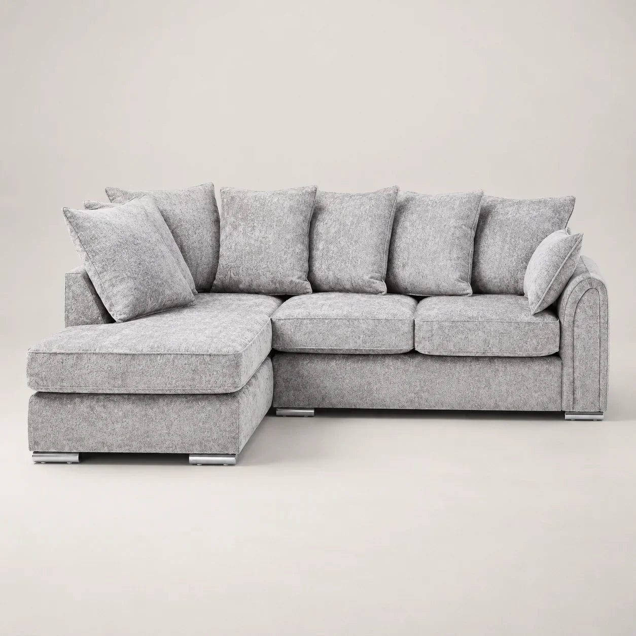 Luxury grey fabric corner sofa with chaise and plush cushions, modern living room furniture