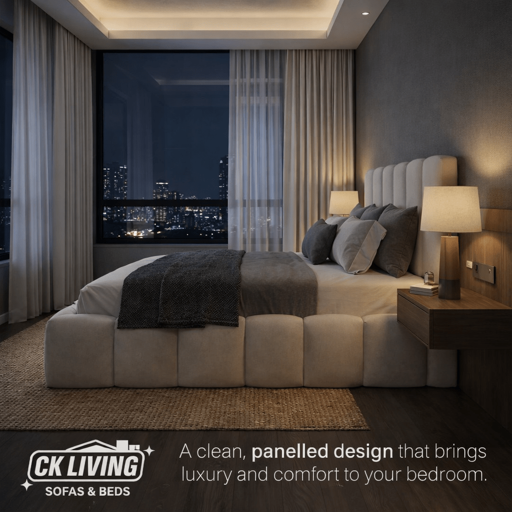 Modern luxury bedroom with a panelled bed, large windows, and ambient lighting at night.