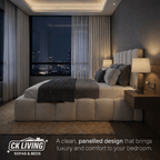 Modern luxury bedroom with a panelled bed, large windows, and ambient lighting at night.