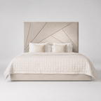 Luxury beige upholstered bed with geometric headboard, quilted duvet, and accent pillows for modern bedroom