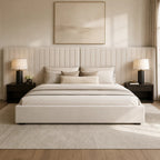 Luxury upholstered bed with tufted headboard, neutral bedding, and modern nightstands in a serene bedroom