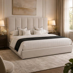 Luxury upholstered bed with tufted headboard, white bedding, and black throw in elegant bedroom