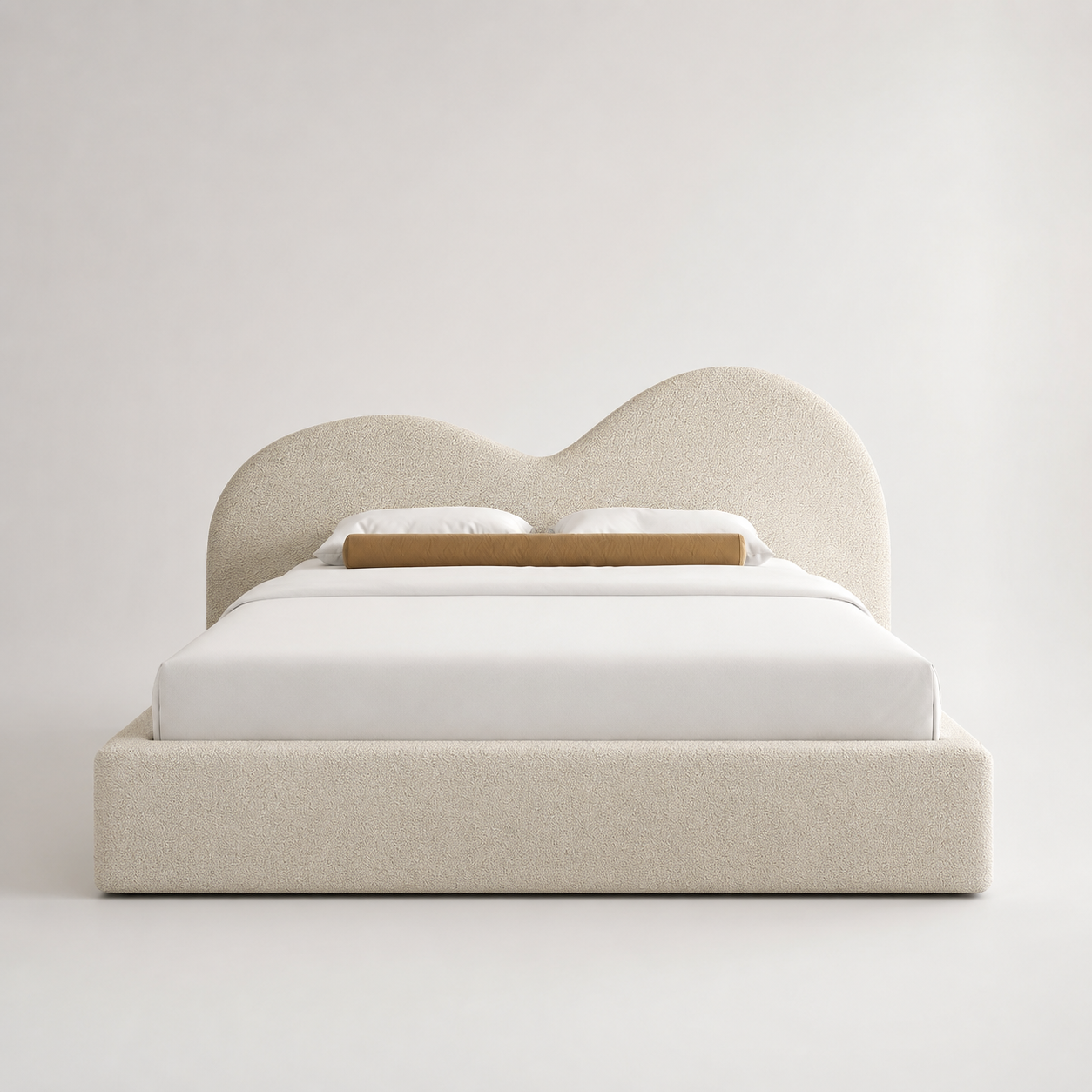 Luxury upholstered bed with curved headboard, white bedding, and beige textured fabric