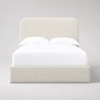 Luxury upholstered bed frame with white bedding, modern minimalist design for contemporary bedrooms