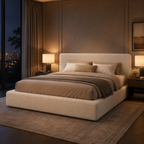 Luxury upholstered bed with neutral bedding in modern bedroom, city view at night