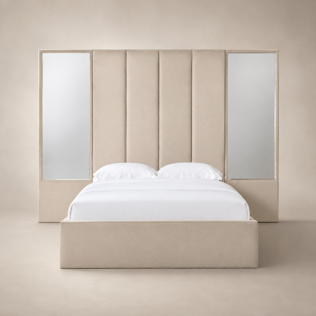 Luxury beige upholstered bed with mirrored panels and white linens, modern bedroom furniture