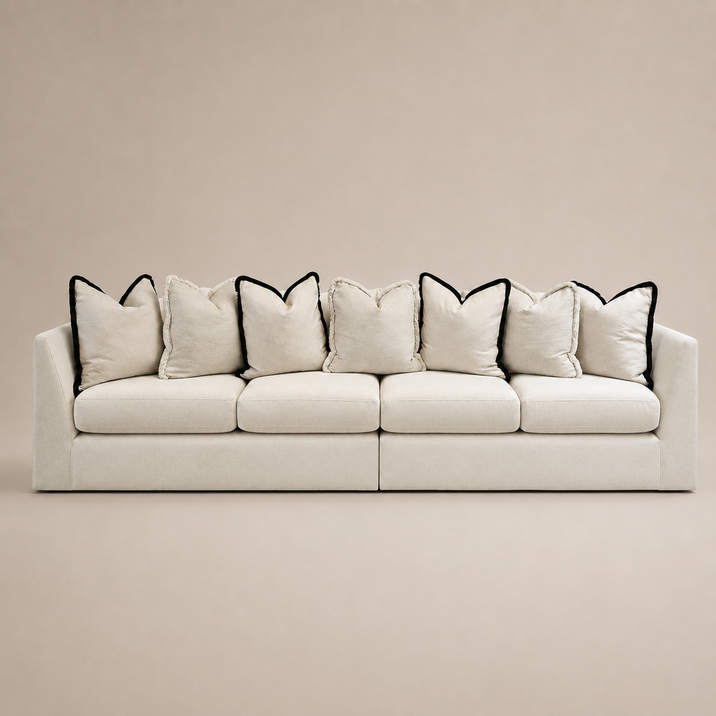 Luxury beige sofa with black-trimmed pillows, modern design for living room comfort