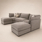Luxury grey sectional sofa with chaise lounges and decorative pillows, perfect for modern living rooms