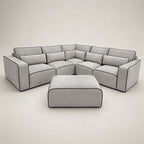 Modern grey sectional sofa with black piping and matching ottoman, luxury living room furniture
