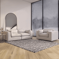 Modern white textured sofa and armchair set in minimalist living room with zebra rug and arched mirror