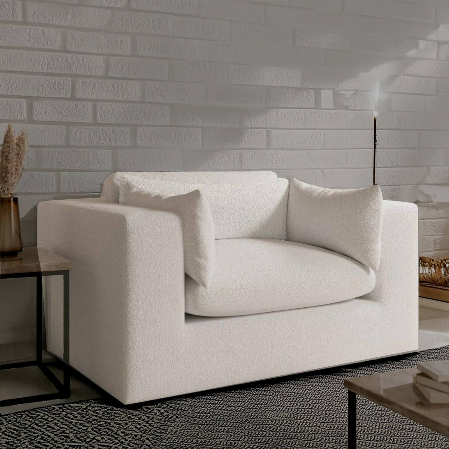 Modern white textured sofa with plush cushions against brick wall, luxury living room furniture