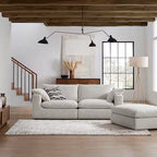 Modern 3-seater beach linen sofa with chaise in a stylish, minimalist living room setting