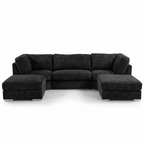 Modern dark grey L-shaped sectional sofa with spacious chaise and metal legs on white background