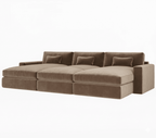 Large modern brown velvet sectional sofa with plush cushions and low profile design