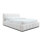 Modern white upholstered bed with tufted headboard and low profile frame