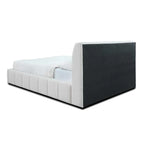 Modern upholstered platform bed with white fabric and tall cushioned headboard