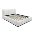 Modern white upholstered bed frame with vertical panel headboard and slatted base