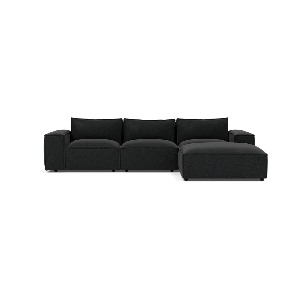Modern dark grey L-shaped sectional sofa with wide cushions and chaise lounge