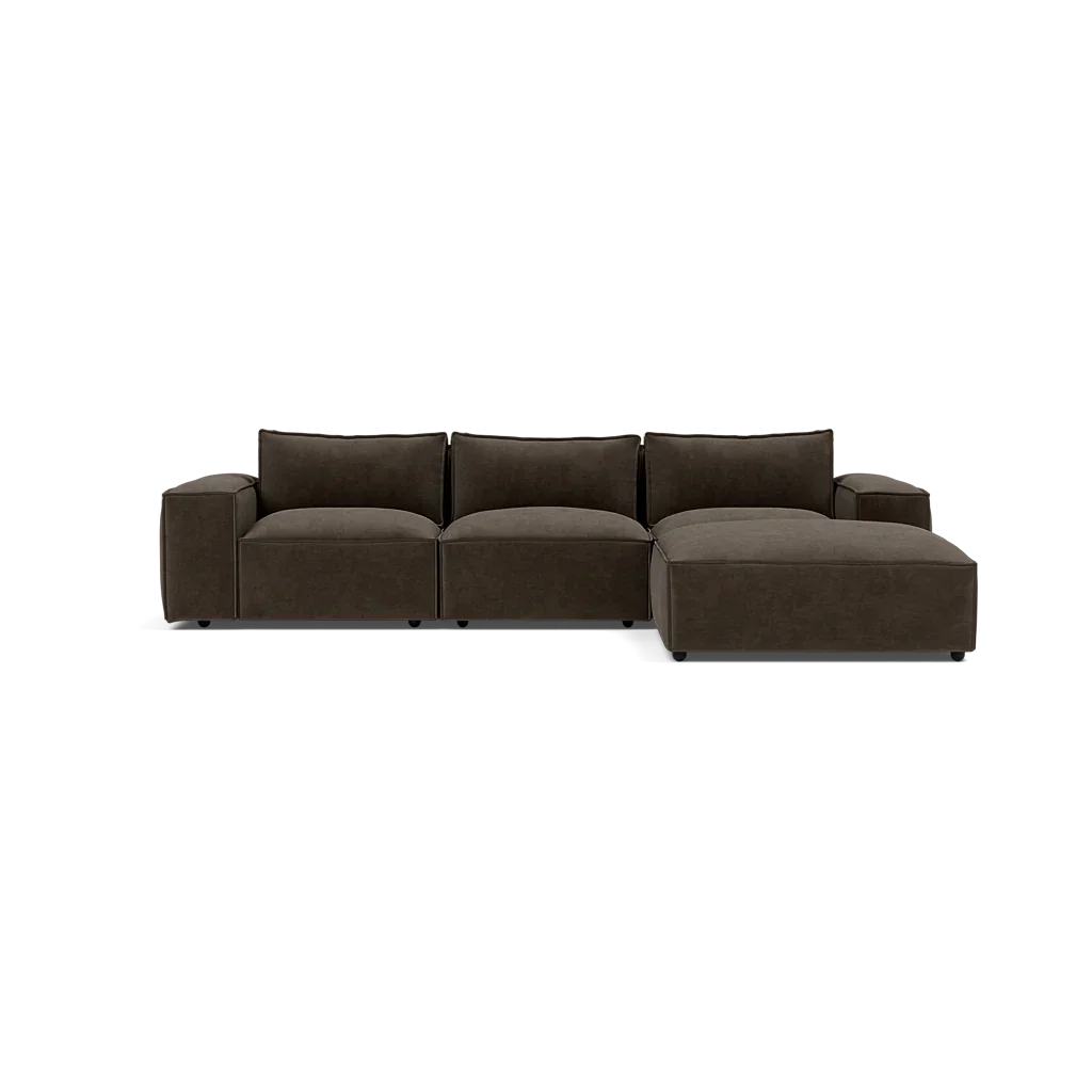 Modern brown sectional sofa with chaise, plush cushions, and wide armrests on white background