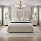 Luxury upholstered bed with tall headboard, white bedding, and modern bedroom decor