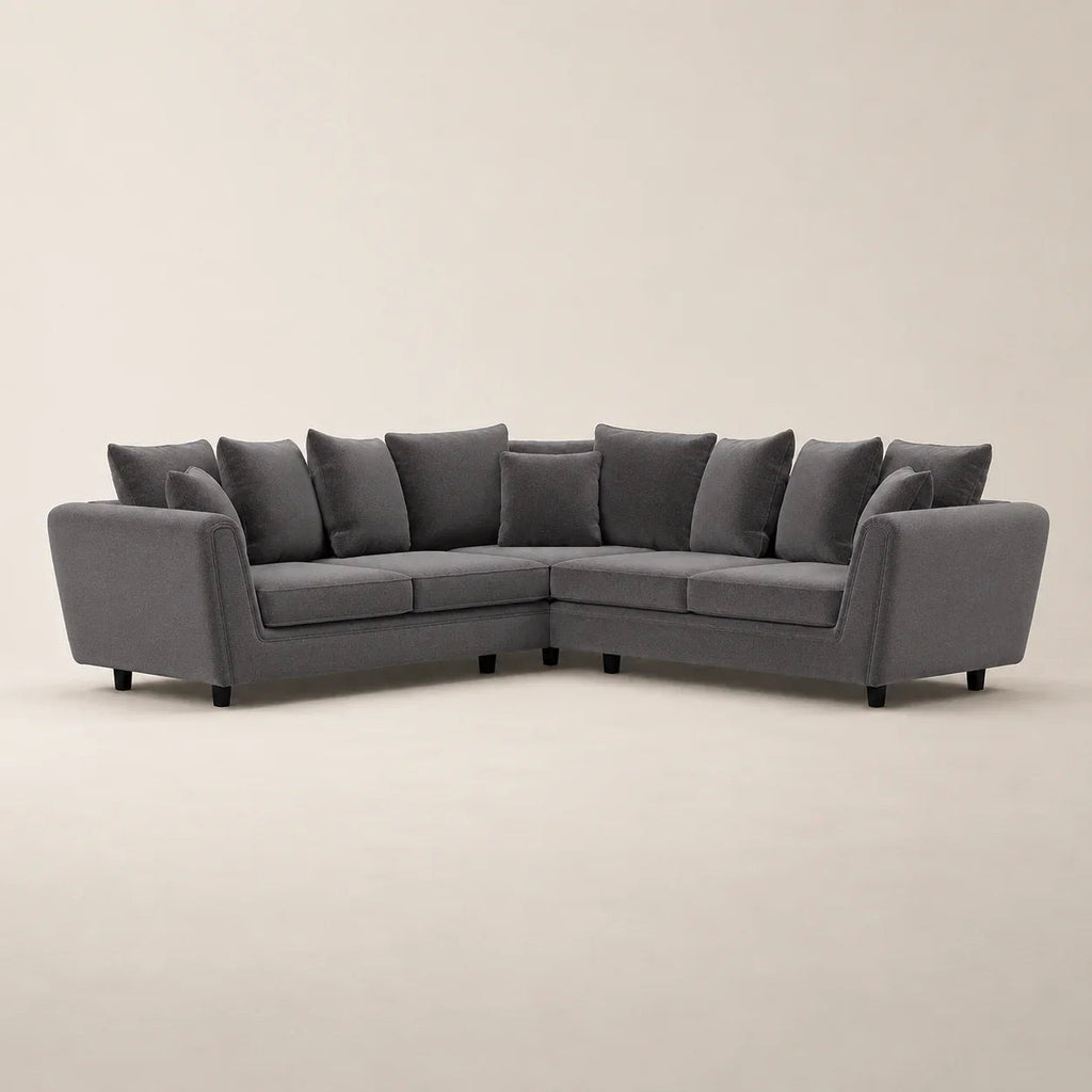 Grey L-shaped sectional sofa with plush cushions, modern luxury living room furniture