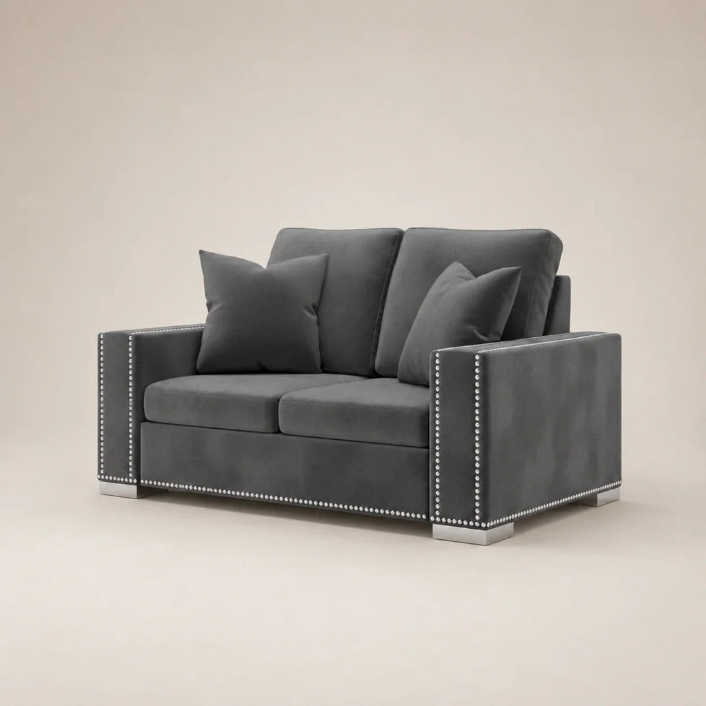 Grey velvet two-seater sofa with nailhead trim and matching cushions, modern luxury living room furniture