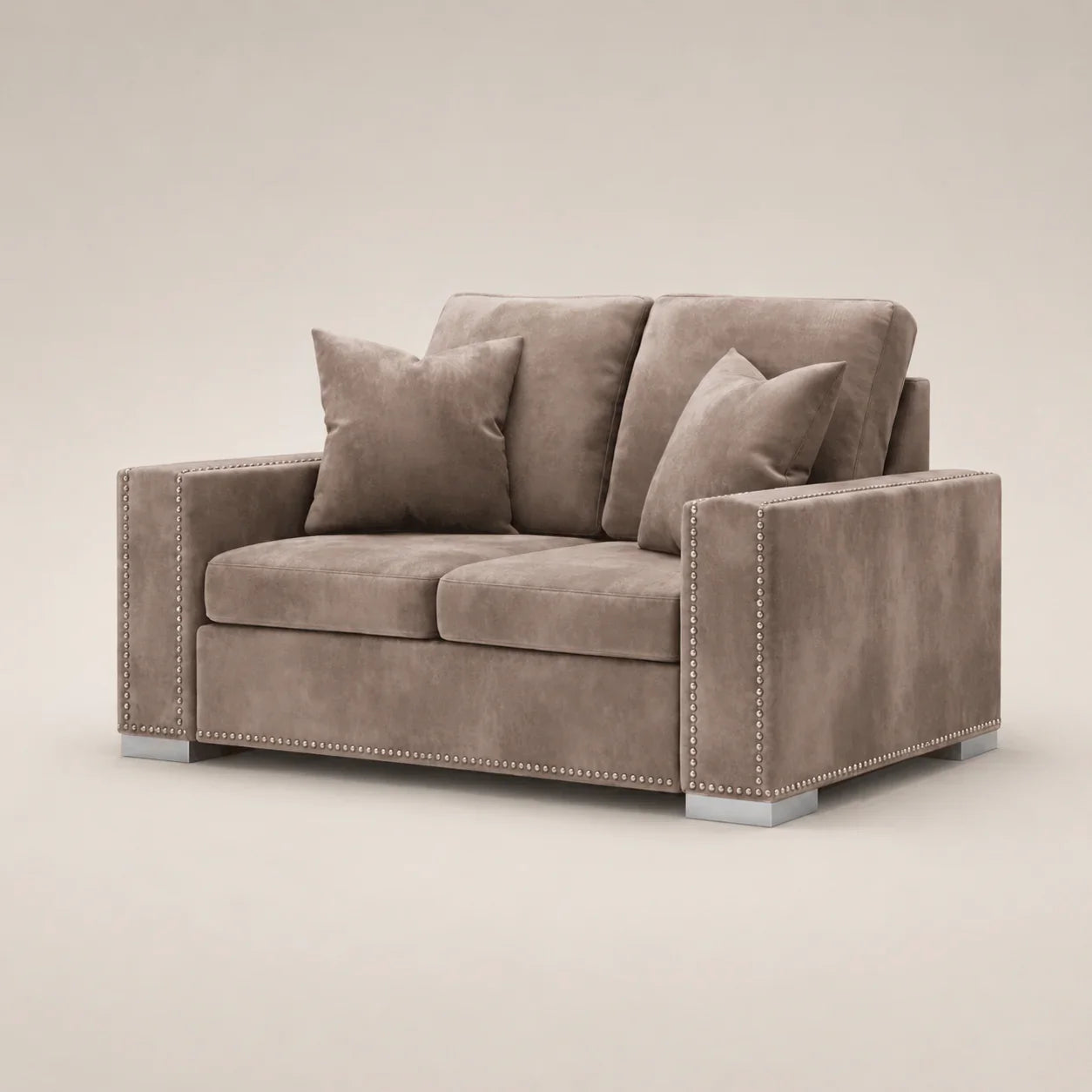 Luxury grey velvet two-seater sofa with nailhead trim and matching cushions, ideal for modern living rooms.